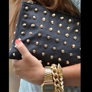 Black leather studded clutch with gold chain strap, Made in Italy